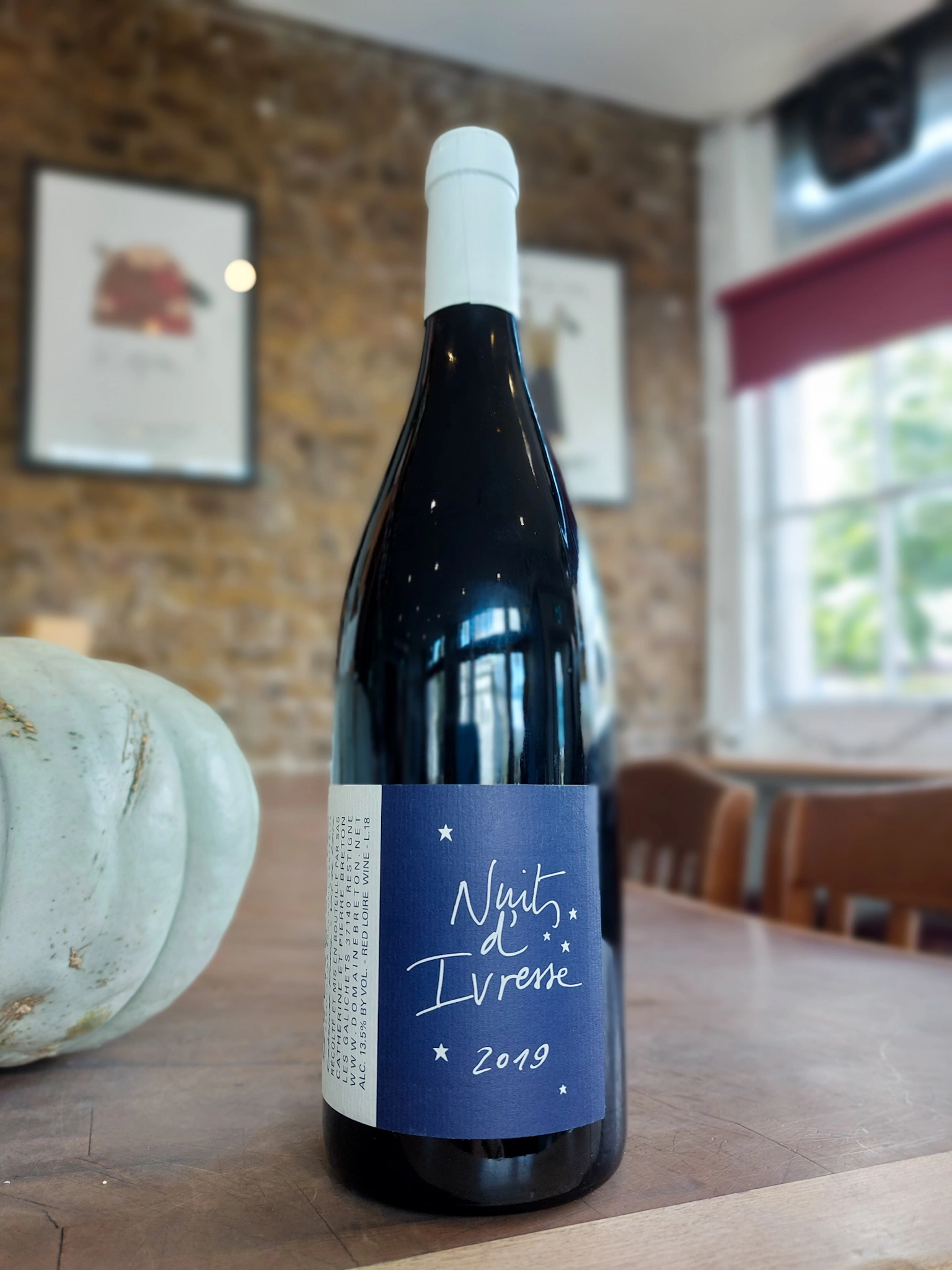 A bottle of Domaine Breton's 2019 Nuits d'Ivresse